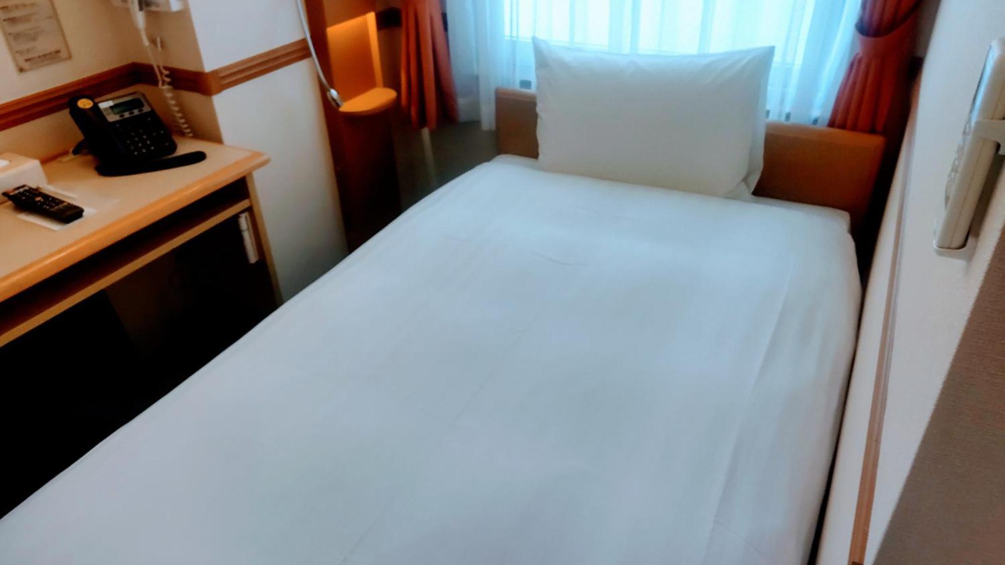 Toyoko Inn Shin-Osaka Chuo-Guchi Shinkan Habitación foto